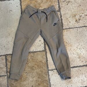 Nike Kids Taupe Nike Tech pants never worn.